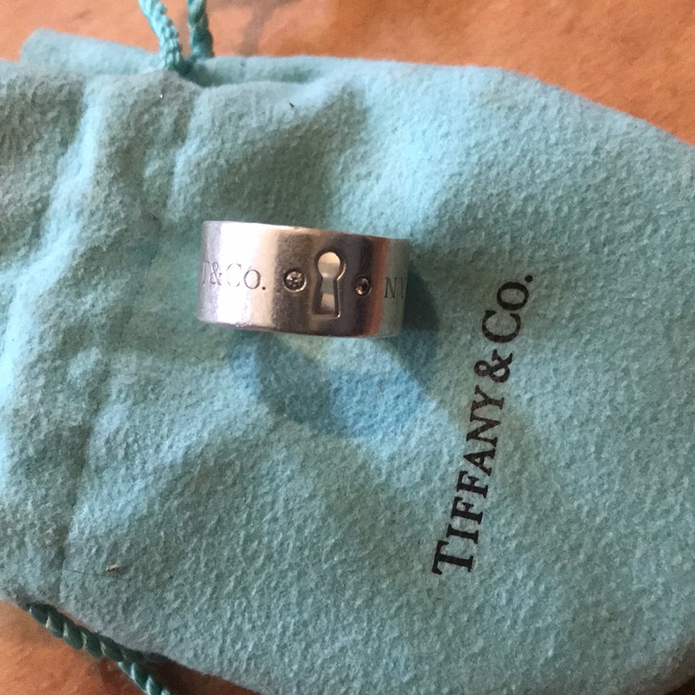 Key hole Tiffany & Co. ring with diamonds.